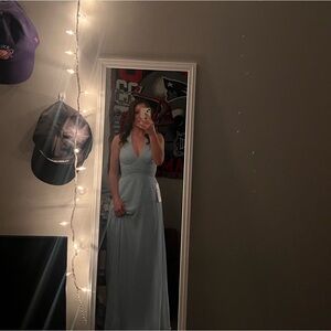 Hi! I am selling this unaltered, never worn bridesmaid/wedding guest dress.